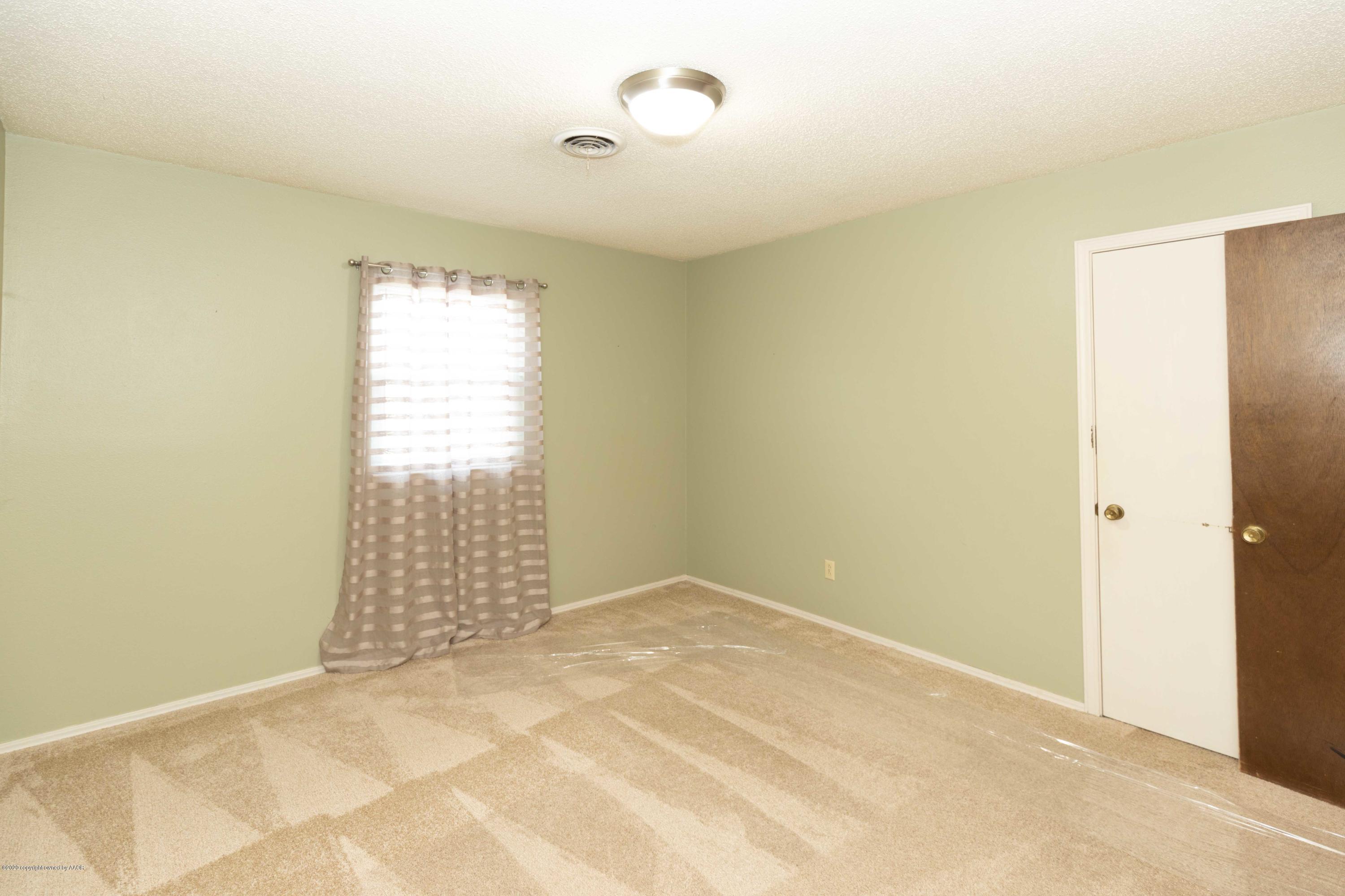 4924 South Georgia Street Amarillo, TX 79110 - Photo 29 of 35 a view of an empty room with a window