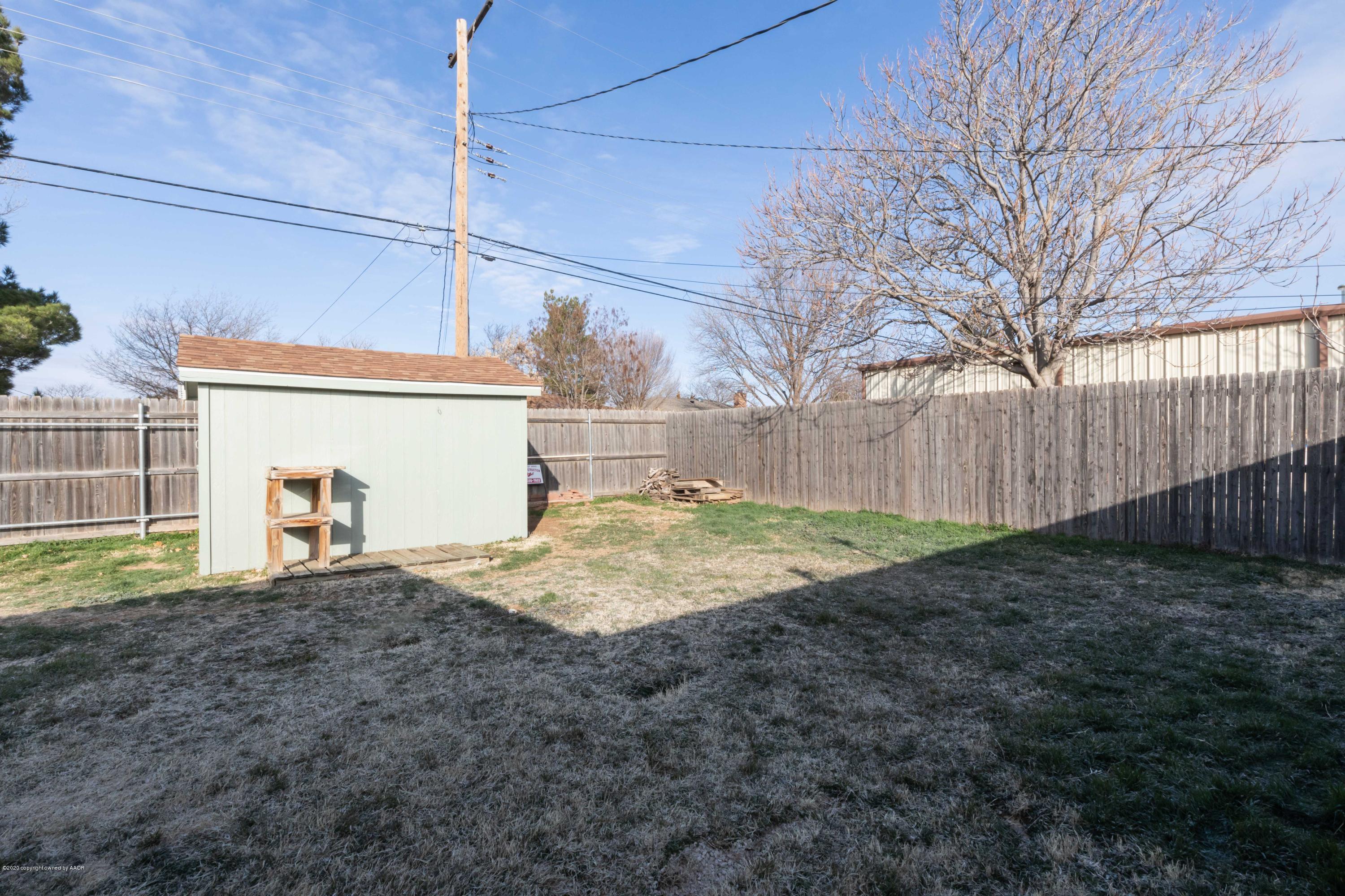 4924 South Georgia Street Amarillo, TX 79110 - Photo 34 of 35 a view of backyard and tree