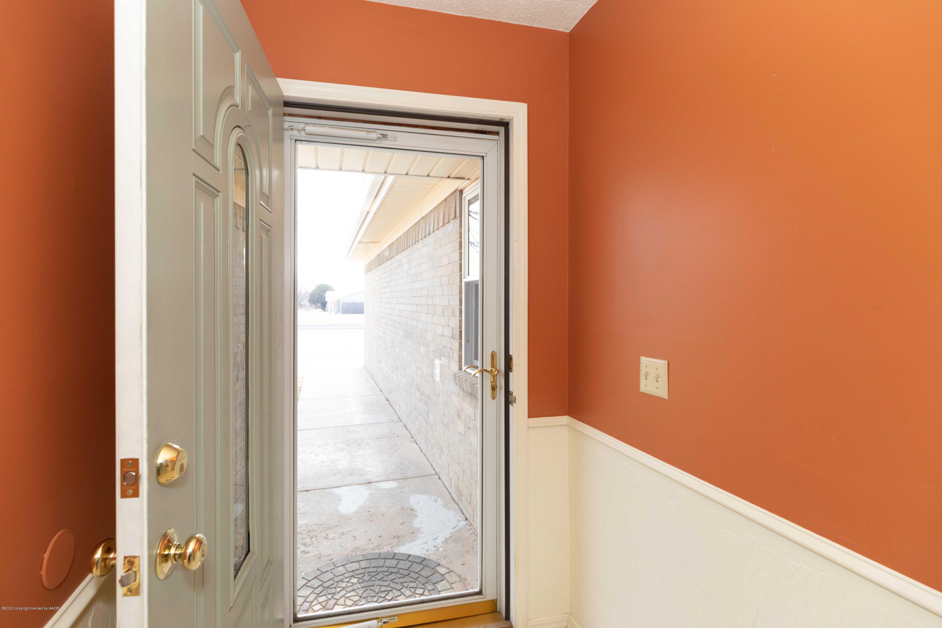 4924 South Georgia Street Amarillo, TX 79110 - Photo 4 of 35 a view of a glass door with a glass door