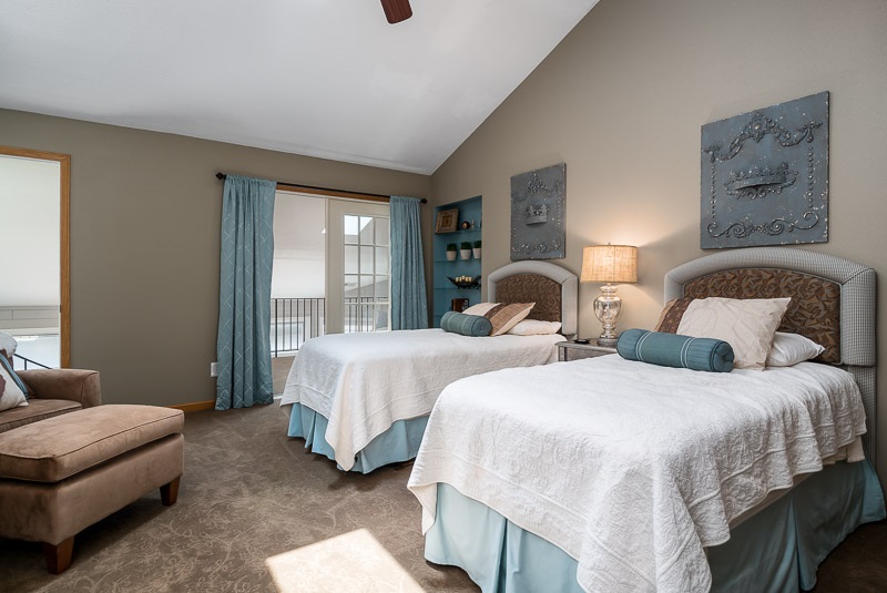 10762 Shaw Road Rockford, IL 61114 - Photo 22 of 25 a bedroom with two beds and large window