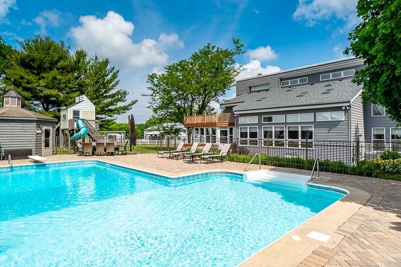 10762 Shaw Road Rockford, IL 61114 - Photo 4 of 25 a view of a swimming pool with lounge chair