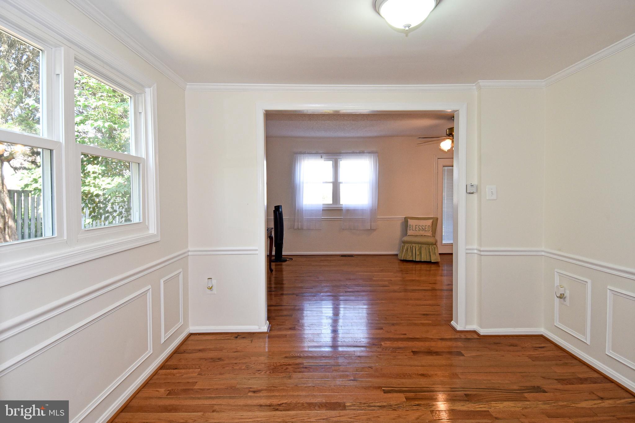 8482 Stonewall Road Manassas, VA 20110 - Photo 11 of 36 Beautiful Dining with moldings and wood