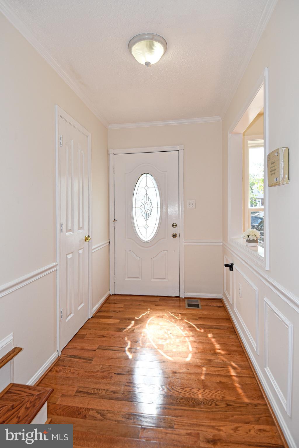 8482 Stonewall Road Manassas, VA 20110 - Photo 3 of 36 Light filled home, front door view