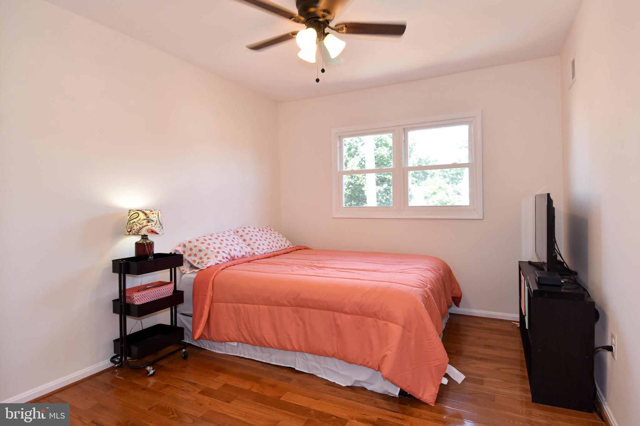 8482 Stonewall Road Manassas, VA 20110 - Photo 24 of 36 Another large all hardwood bedroom