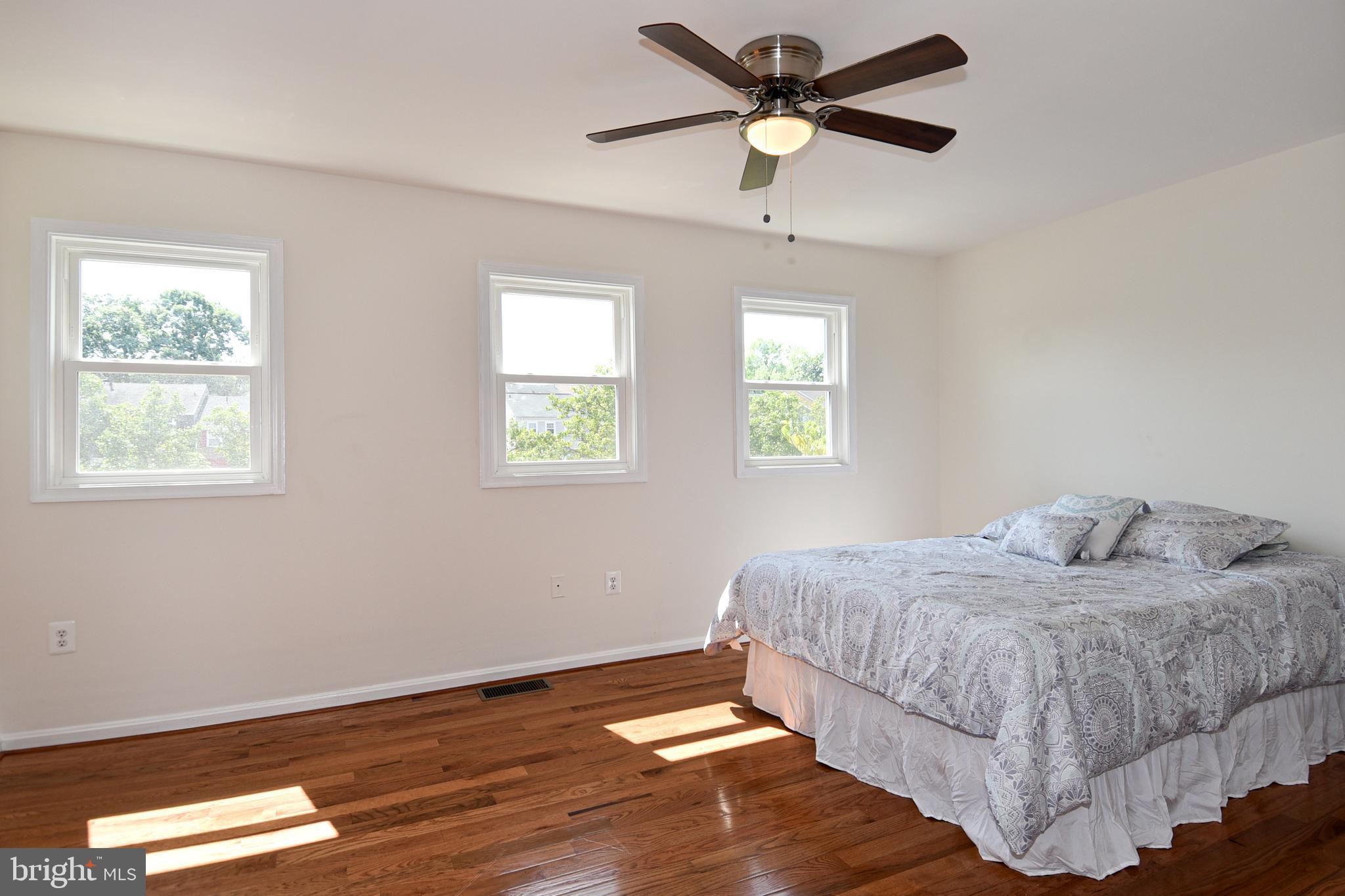 8482 Stonewall Road Manassas, VA 20110 - Photo 26 of 36 Master Bedroom with queen bed