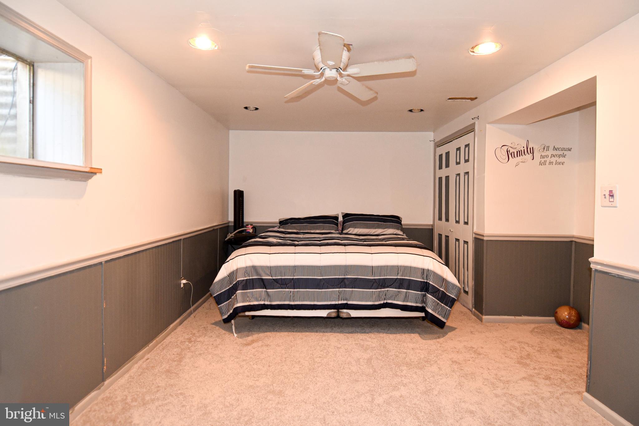 8482 Stonewall Road Manassas, VA 20110 - Photo 32 of 36 Downstairs rec room currently used as a bedroom