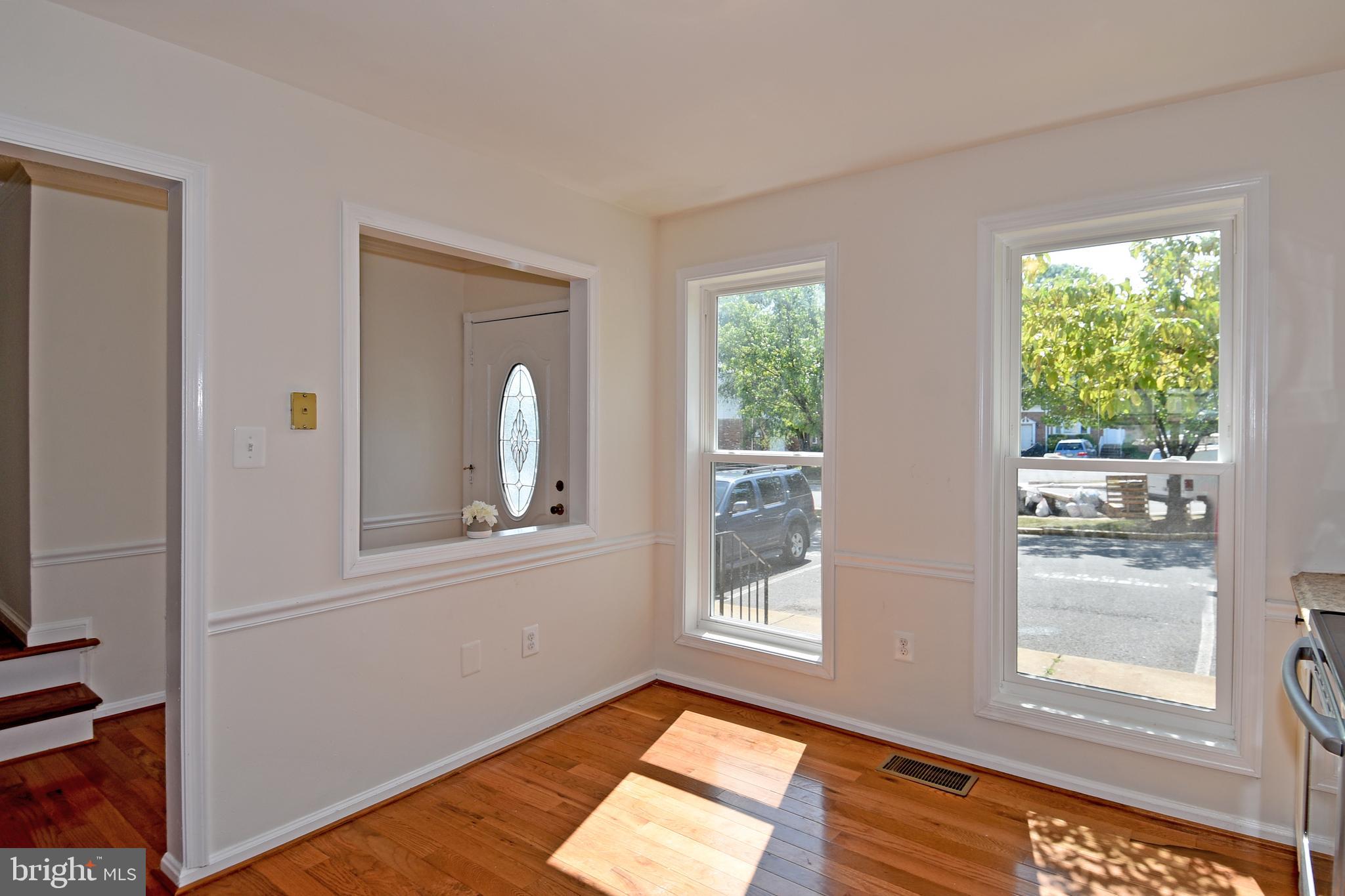 8482 Stonewall Road Manassas, VA 20110 - Photo 10 of 36 Open from front door to kitchen view