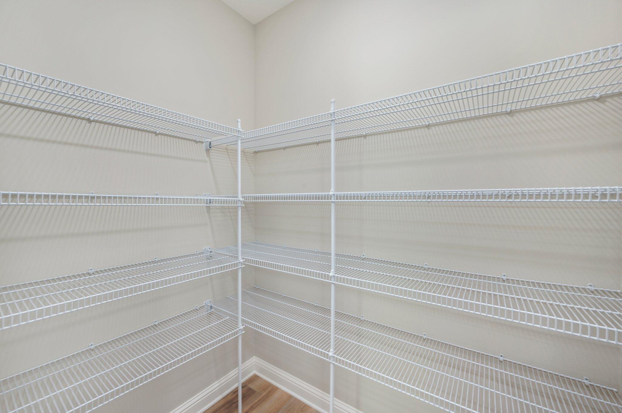 6043 Sand Hill Road Crestview, FL 32539 - Photo 32 of 36 a view of a room with empty racks