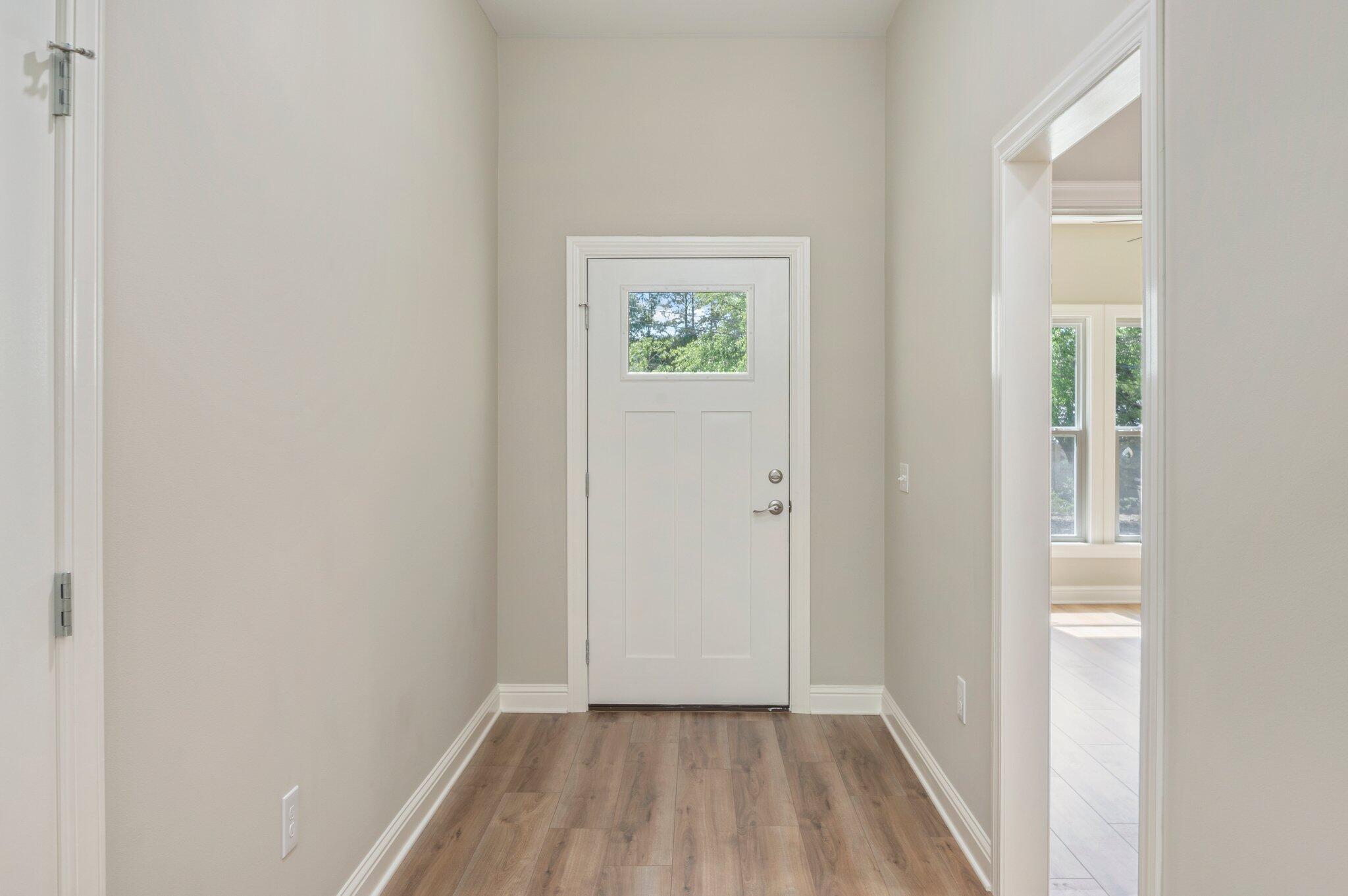 6043 Sand Hill Road Crestview, FL 32539 - Photo 5 of 36 a view of an empty room with closet and a window