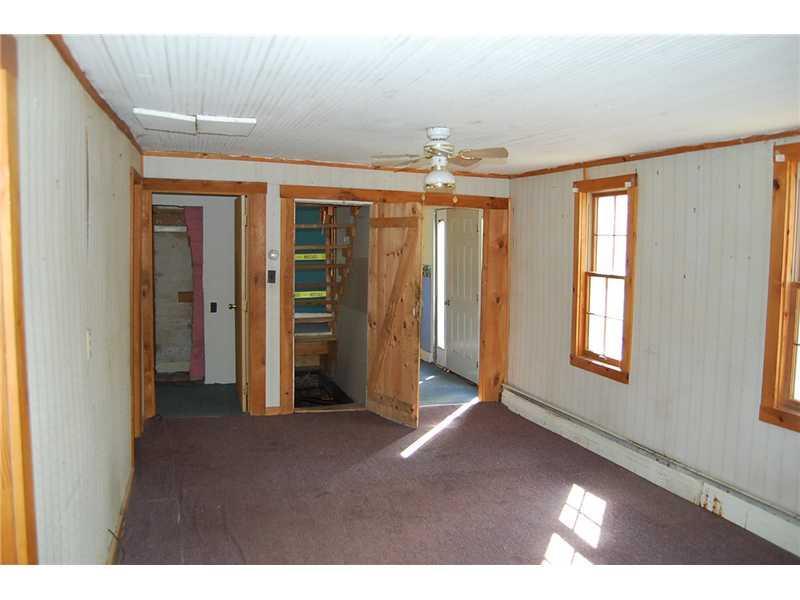 693 Ft Knox Road Prospect, ME 04981 - Photo 6 of 10 Living Room.