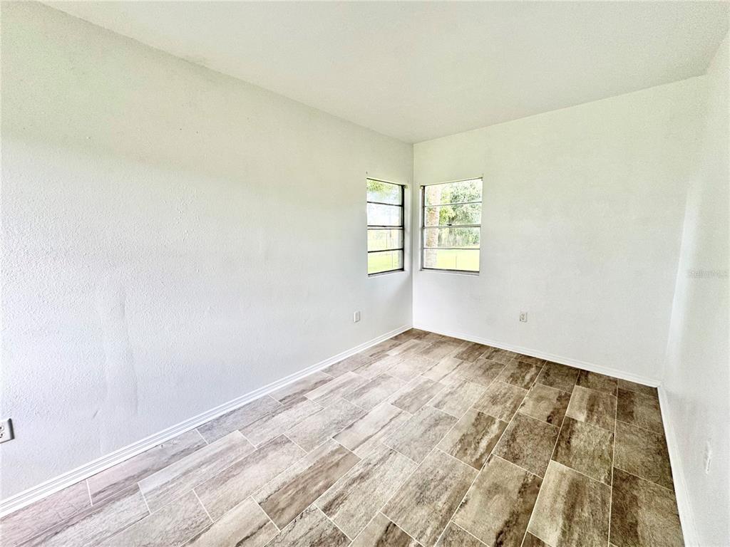 412 Bay Street Northwest Fort Meade, FL 33841 - Photo 12 of 14 an empty room with a window