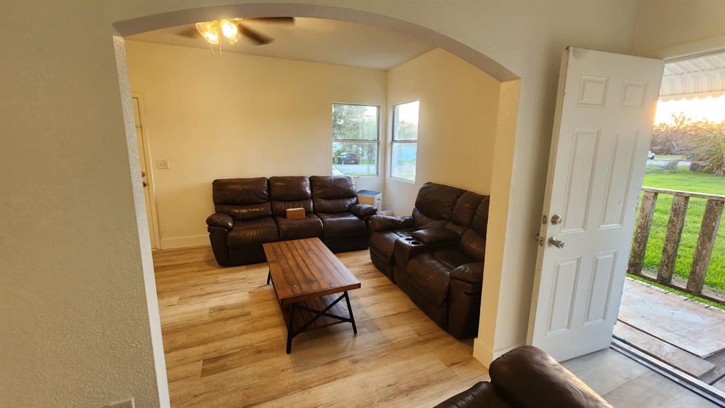 412 Bay Street Northwest Fort Meade, FL 33841 - Photo 3 of 14 a living room with furniture and a window