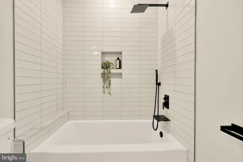 a bathroom with a bathtub