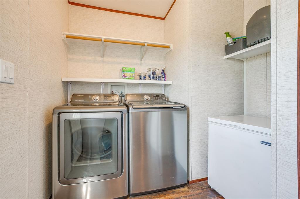 321 Young Road Millsap, TX 76066 - Photo 15 of 28 a utility room with dryer and washer