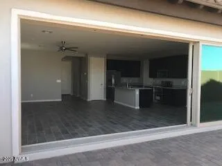a view of a hallway with an empty room