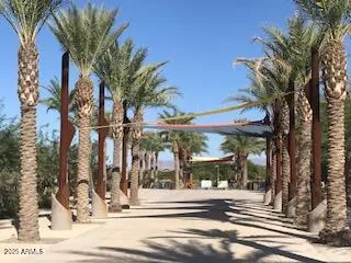 a view of a building with a tree in front