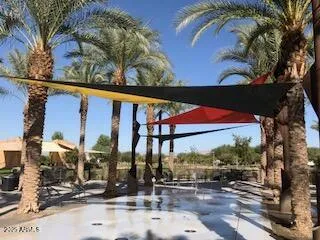 a view of a street with a tree on the side of it