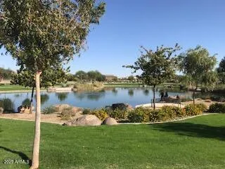a view of a lake with a big yard