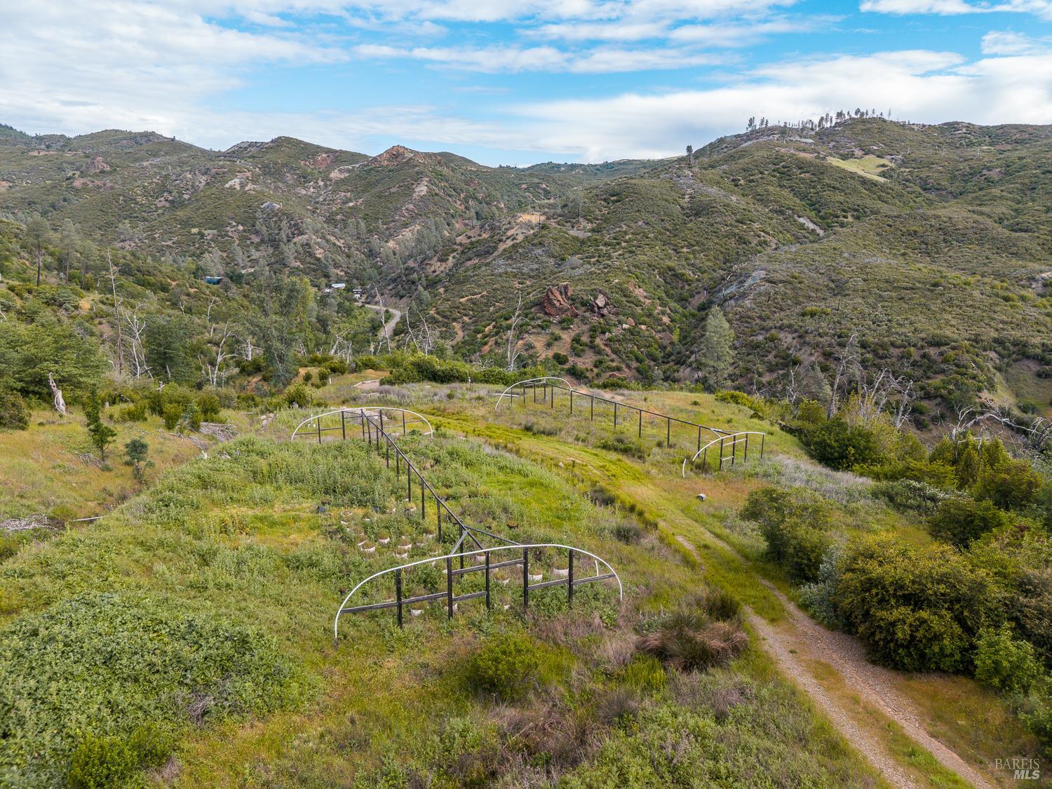 14515 Big Canyon Road Middletown, CA 95461 - Photo 5 of 23 a view of a lake with mountains in the background