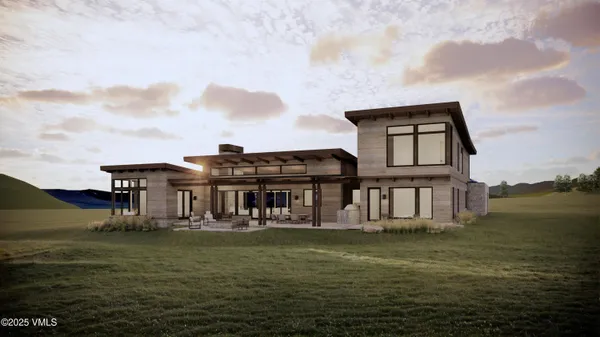 a front view of a house with a ocean view