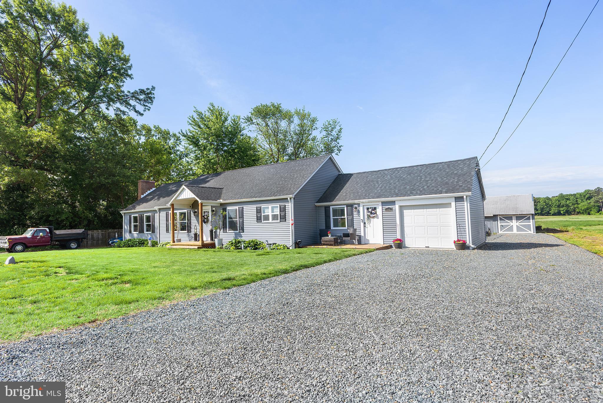 25485 Hignutt Road Denton, MD 21629 - Photo 50 of 52 front view of a house and a yard