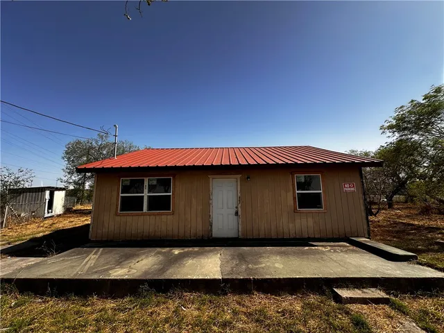 a view of a house with a patio
