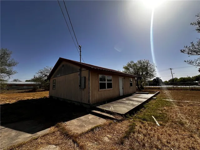 a house view with a lake view