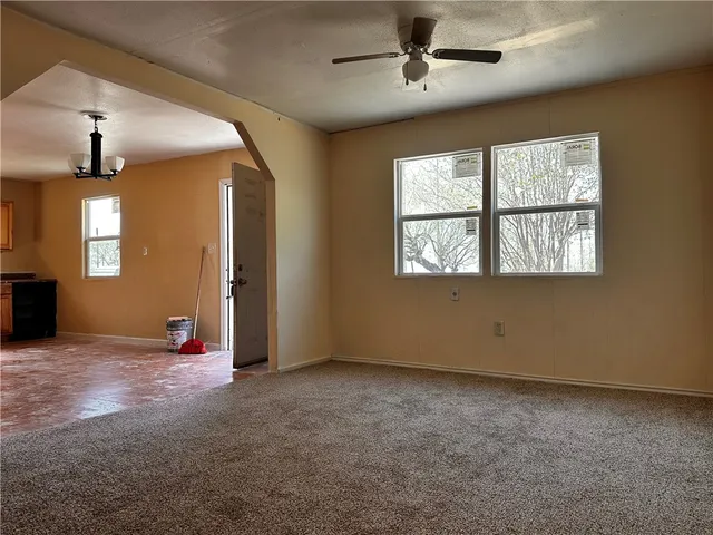 an empty room with windows