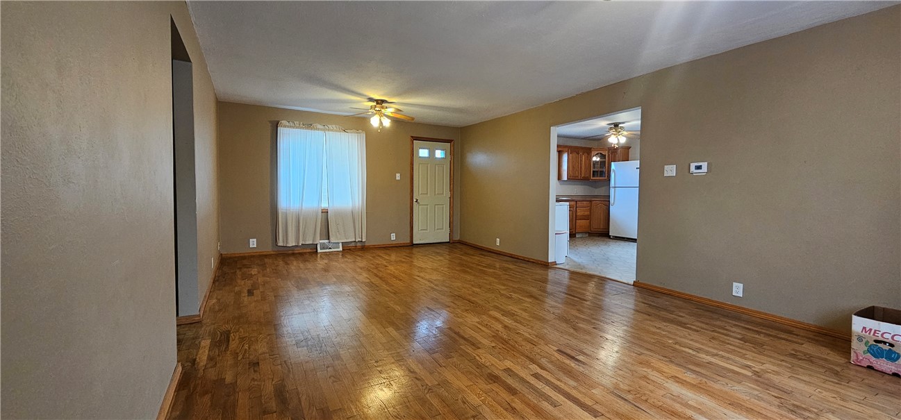206 East Fifth Street St. Peter, IL 62880 - Photo 8 of 23 a view of a livingroom with wooden floor