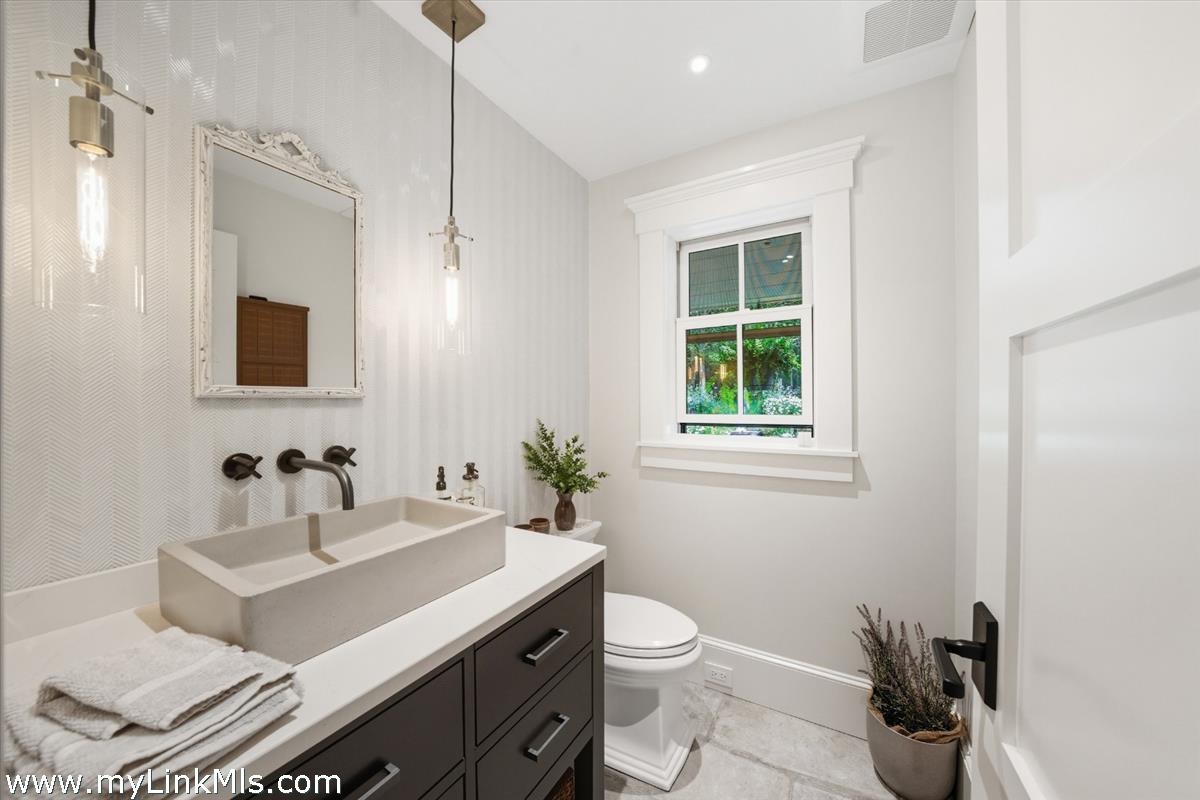 27 Clambelly Road Chilmark, MA 02535 - Photo 23 of 39 a bathroom with a sink toilet and shower