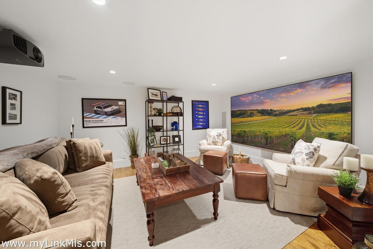 27 Clambelly Road Chilmark, MA 02535 - Photo 31 of 39 a living room with furniture and a large window