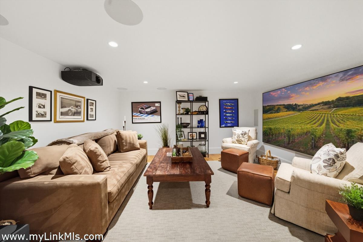 27 Clambelly Road Chilmark, MA 02535 - Photo 32 of 39 a living room with furniture and a large window