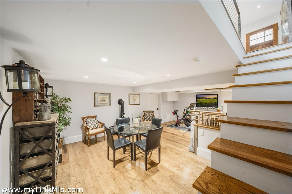 27 Clambelly Road Chilmark, MA 02535 - Photo 33 of 39 a living room with furniture and a flat screen tv