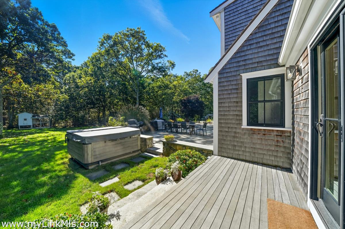 27 Clambelly Road Chilmark, MA 02535 - Photo 34 of 39 a view of a house with a yard