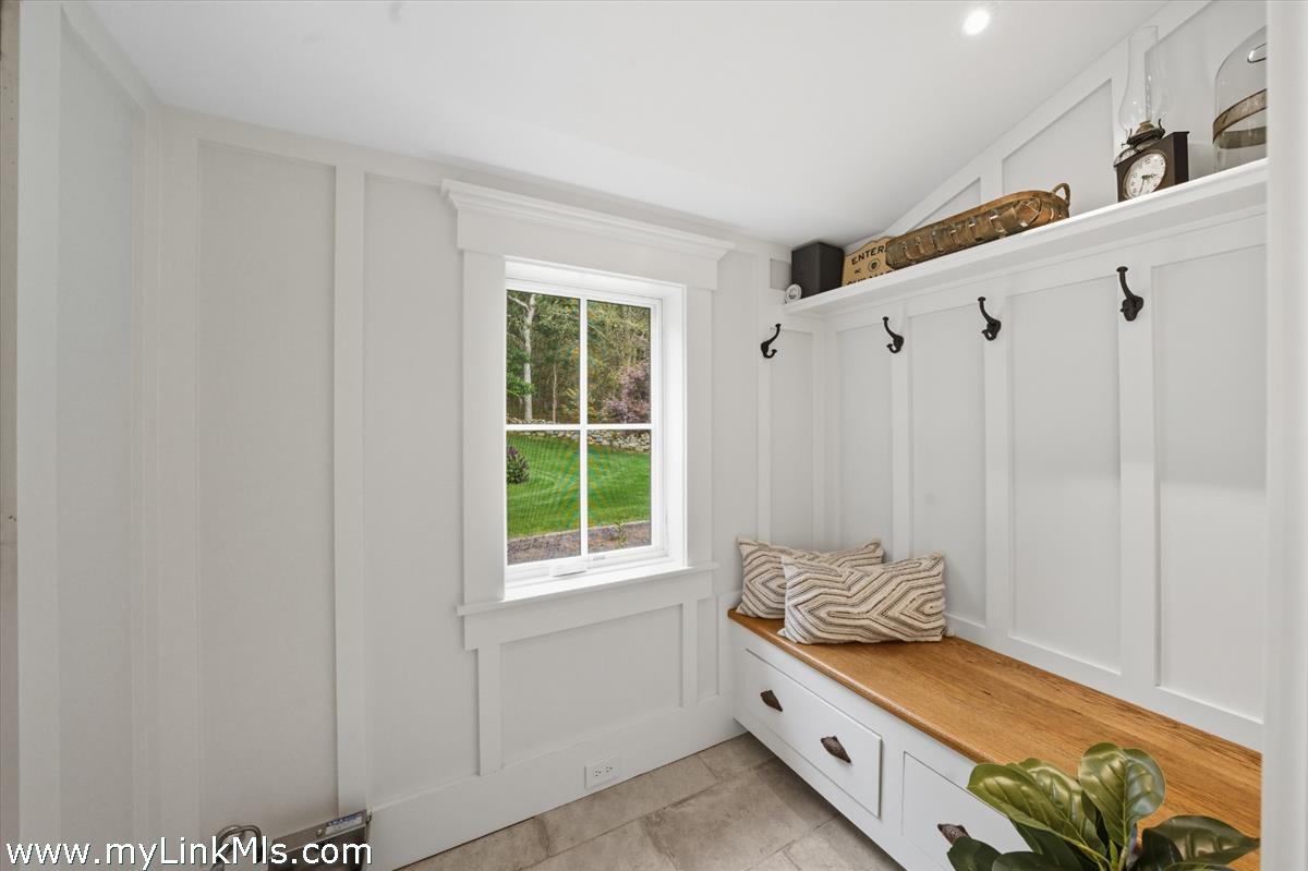 27 Clambelly Road Chilmark, MA 02535 - Photo 4 of 39 a bathroom with a sink and a mirror