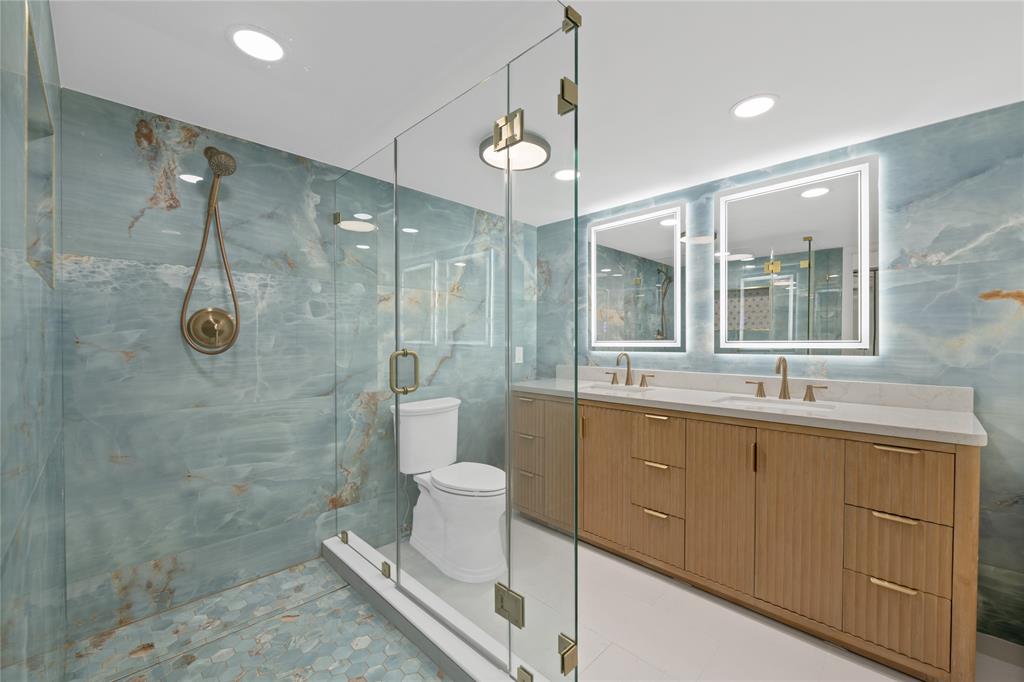 4280 Galt Ocean Drive, Unit 25C Fort Lauderdale, FL 33308 - Photo 16 of 55 a bathroom with a sink a toilet and shower