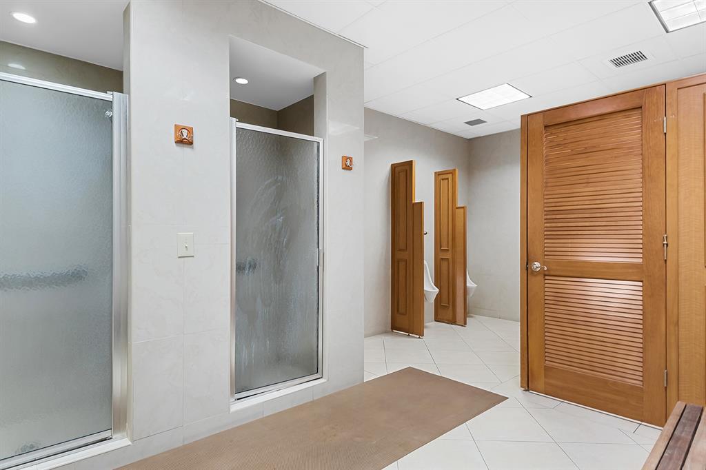 4280 Galt Ocean Drive, Unit 25C Fort Lauderdale, FL 33308 - Photo 54 of 55 a view of a hallway with wooden shelves