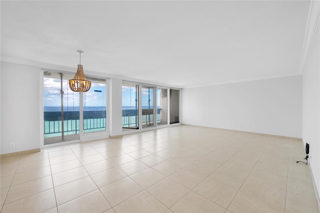 4280 Galt Ocean Drive, Unit 25C Fort Lauderdale, FL 33308 - Photo 6 of 55 a view of an empty room with glass door