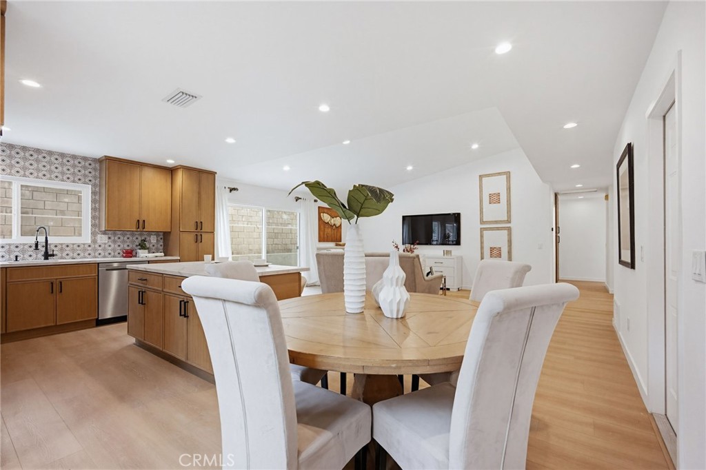 7355 Vineyard Avenue Rancho Cucamonga, CA 91730 - Photo 15 of 38 a view of a dining room with furniture and window