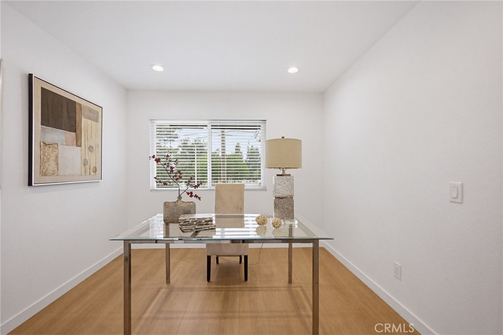 7355 Vineyard Avenue Rancho Cucamonga, CA 91730 - Photo 17 of 38 a living room with furniture and a window