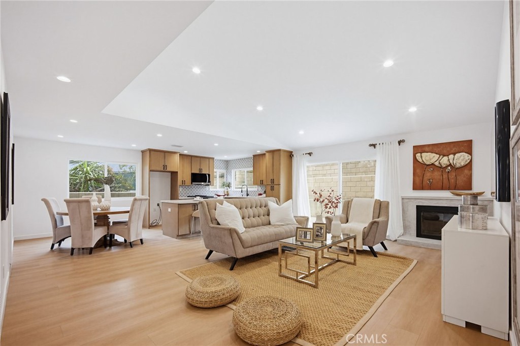 7355 Vineyard Avenue Rancho Cucamonga, CA 91730 - Photo 2 of 38 a living room with furniture and a fireplace
