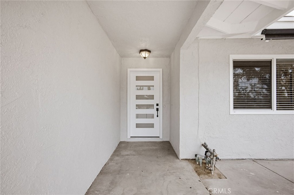 7355 Vineyard Avenue Rancho Cucamonga, CA 91730 - Photo 4 of 38 an empty room with windows
