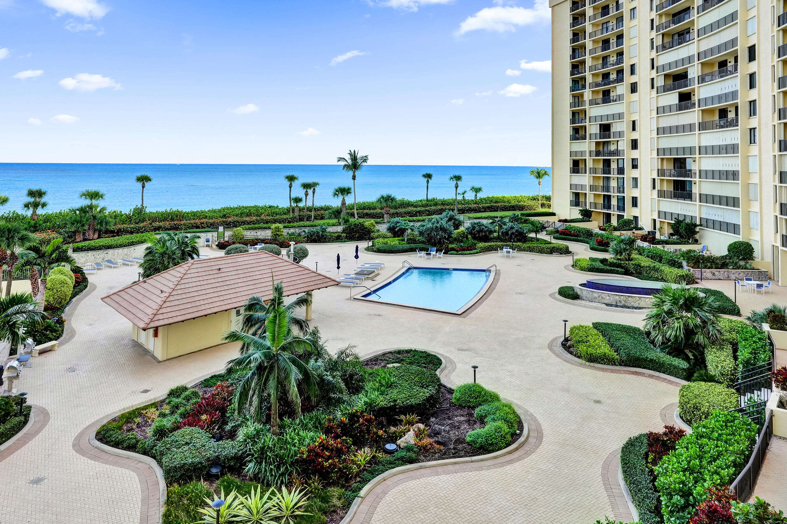 300 Ocean Trail Way, Unit 410 Jupiter, FL 33477 - Photo 4 of 59 Overlooking Pool Deck
