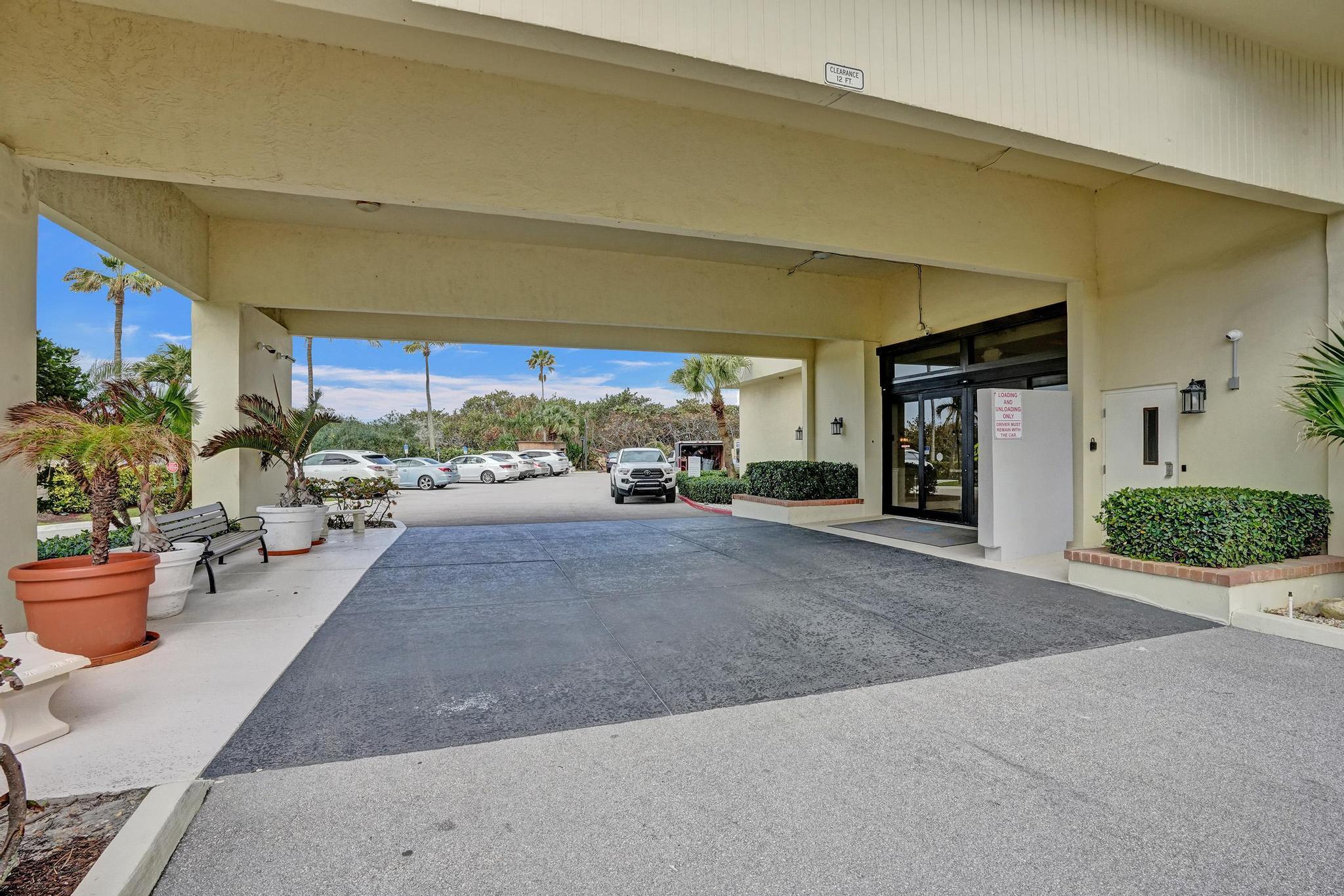 300 Ocean Trail Way, Unit 410 Jupiter, FL 33477 - Photo 49 of 59 300 Building Entrance