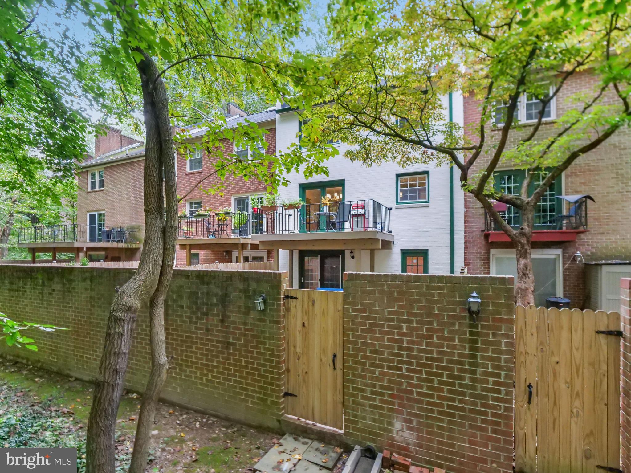 1835 Wainwright Drive Reston, VA 20190 - Photo 39 of 51 A brick wall adds privacy and security