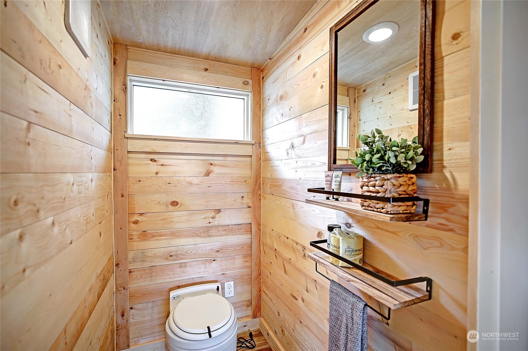 18818 Lerch Road Snohomish, WA 98290 - Photo 16 of 36 a bathroom with a granite countertop sink toilet a mirror and shower