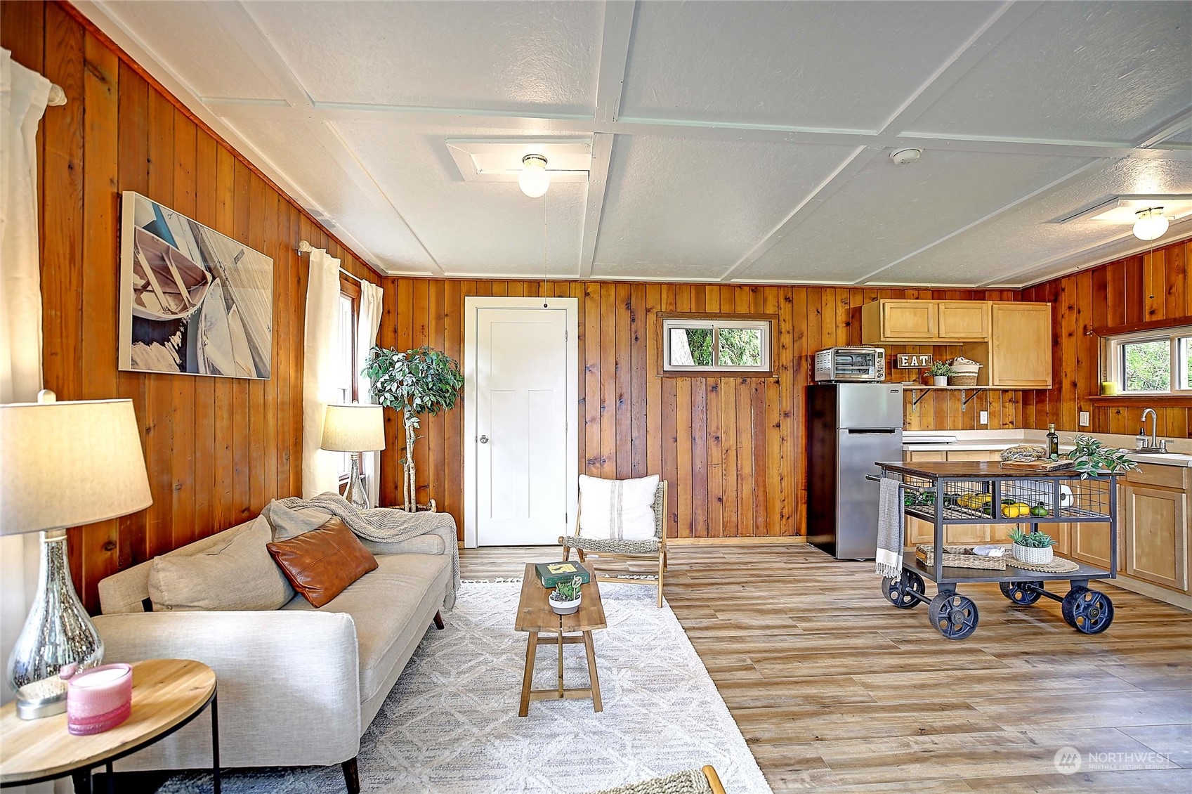18818 Lerch Road Snohomish, WA 98290 - Photo 18 of 36 a living room with furniture and a wooden floor