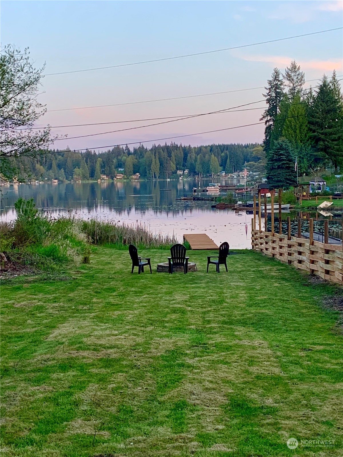 18818 Lerch Road Snohomish, WA 98290 - Photo 20 of 36 a view of a lake with houses in the back