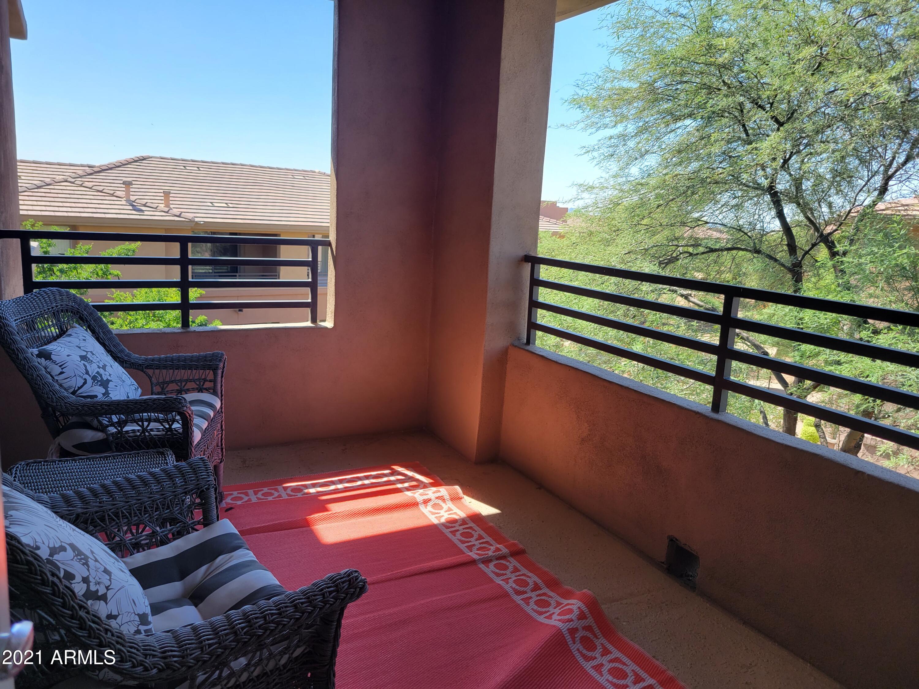 19777 North 76th Street, Unit 3186 Scottsdale, AZ 85255 - Photo 22 of 23 a backyard of a house with seating space