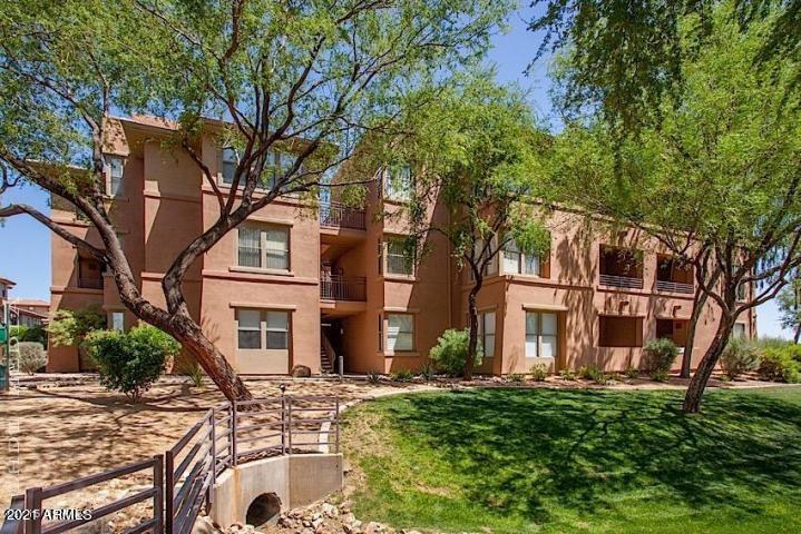 19777 North 76th Street, Unit 3186 Scottsdale, AZ 85255 - Photo 23 of 23 front view of a house with a yard
